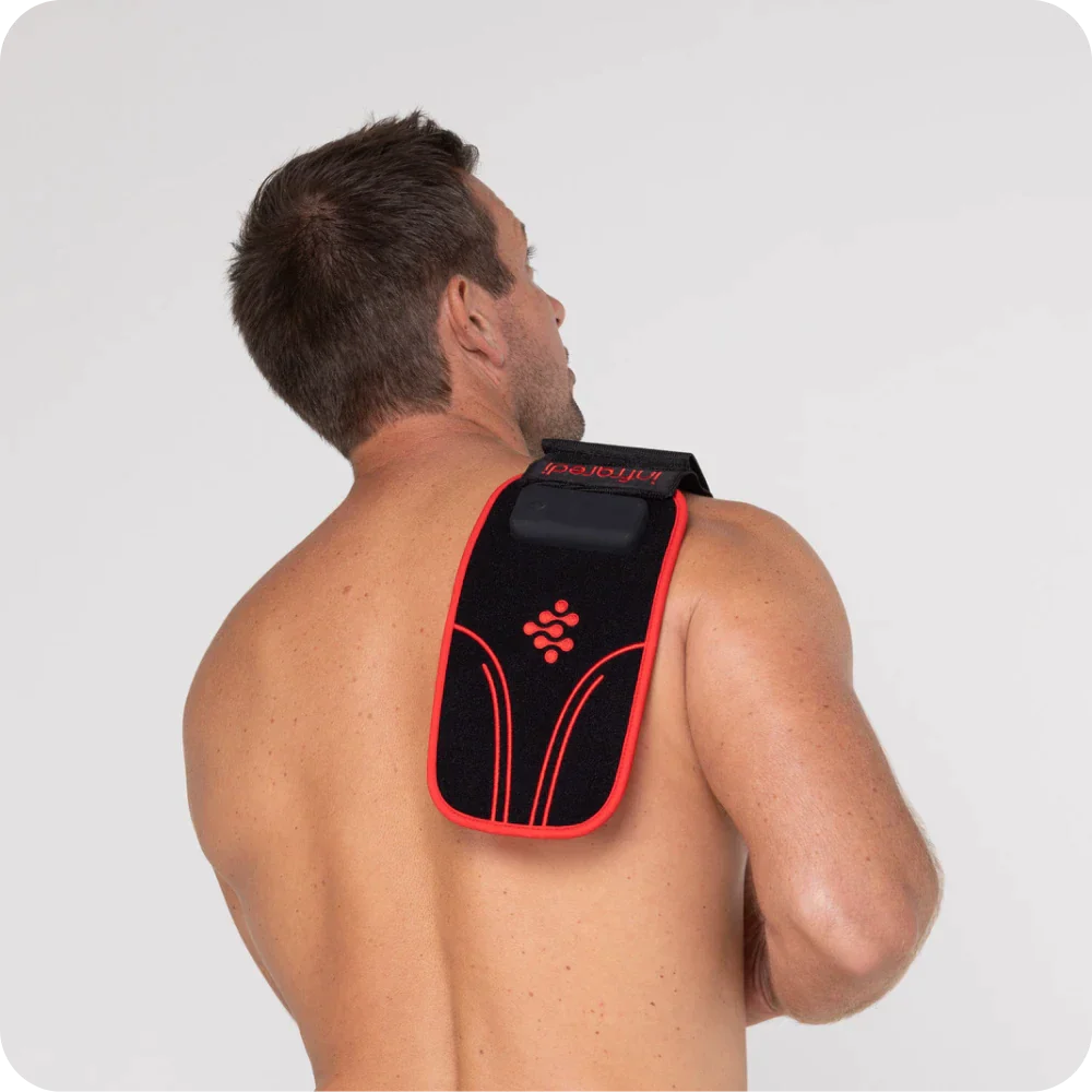 User wearing the Infraredi red light therapy wrap, providing red light therapy for pain relief and muscle healing.