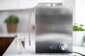 Echo H2 Hydrogen Water Machine on kitchen counter producing hydrogen-enriched water.