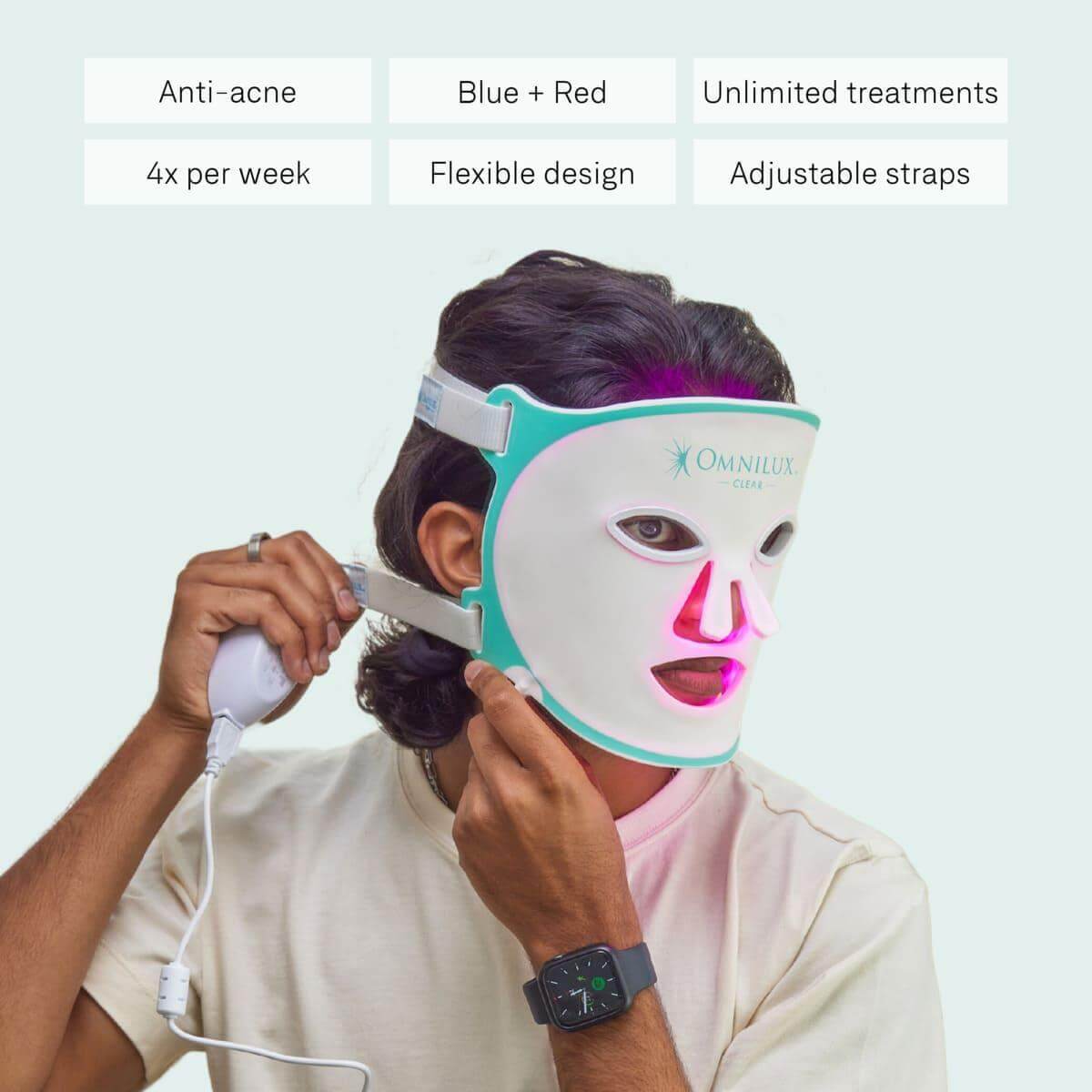 Person using Omnilux Clear red light therapy LED mask with adjustable straps for acne care and flexible design.