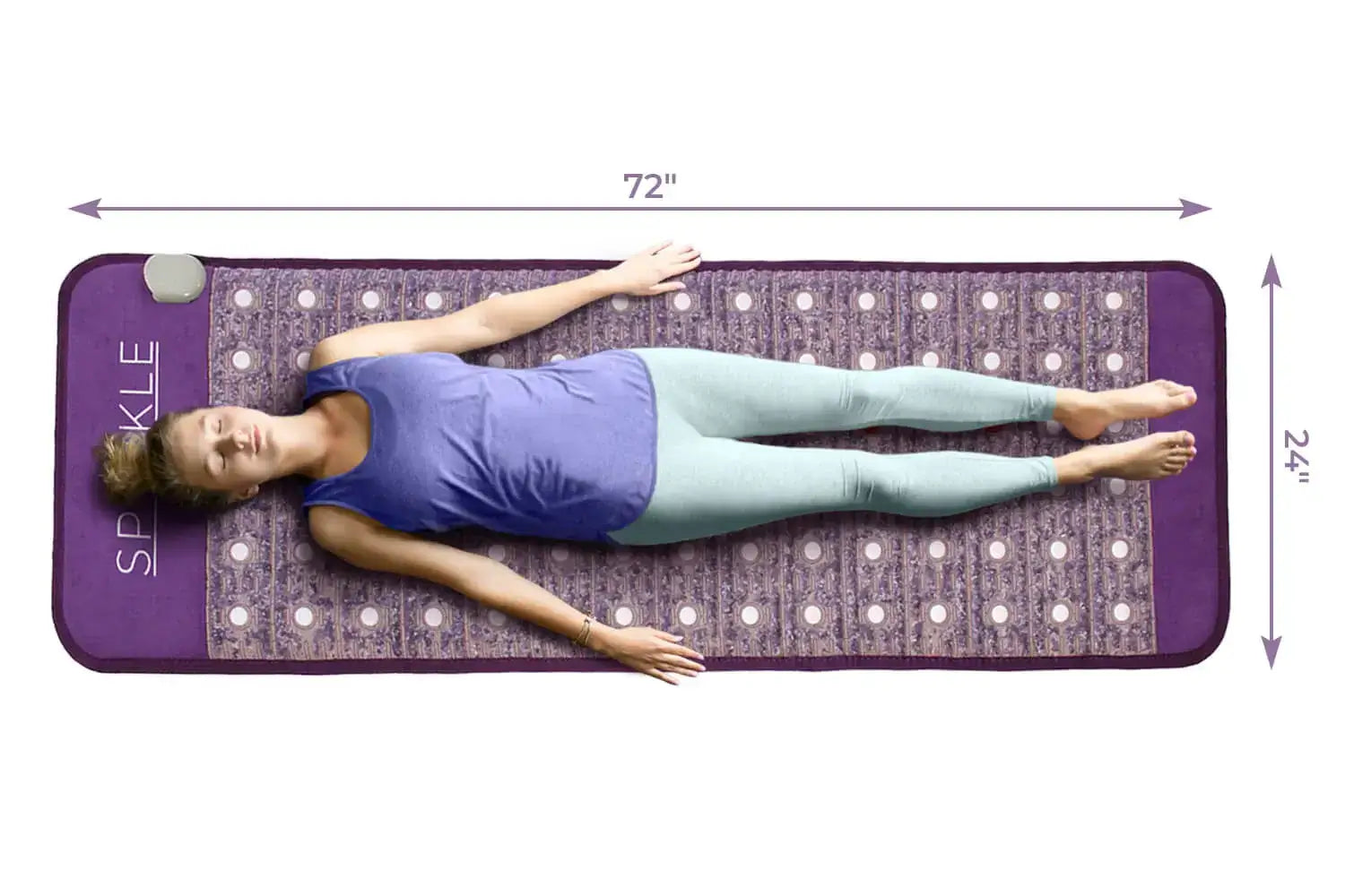 Woman relaxing on a Sparkle Mats Infrared PEMF Mat for pain relief and relaxation.